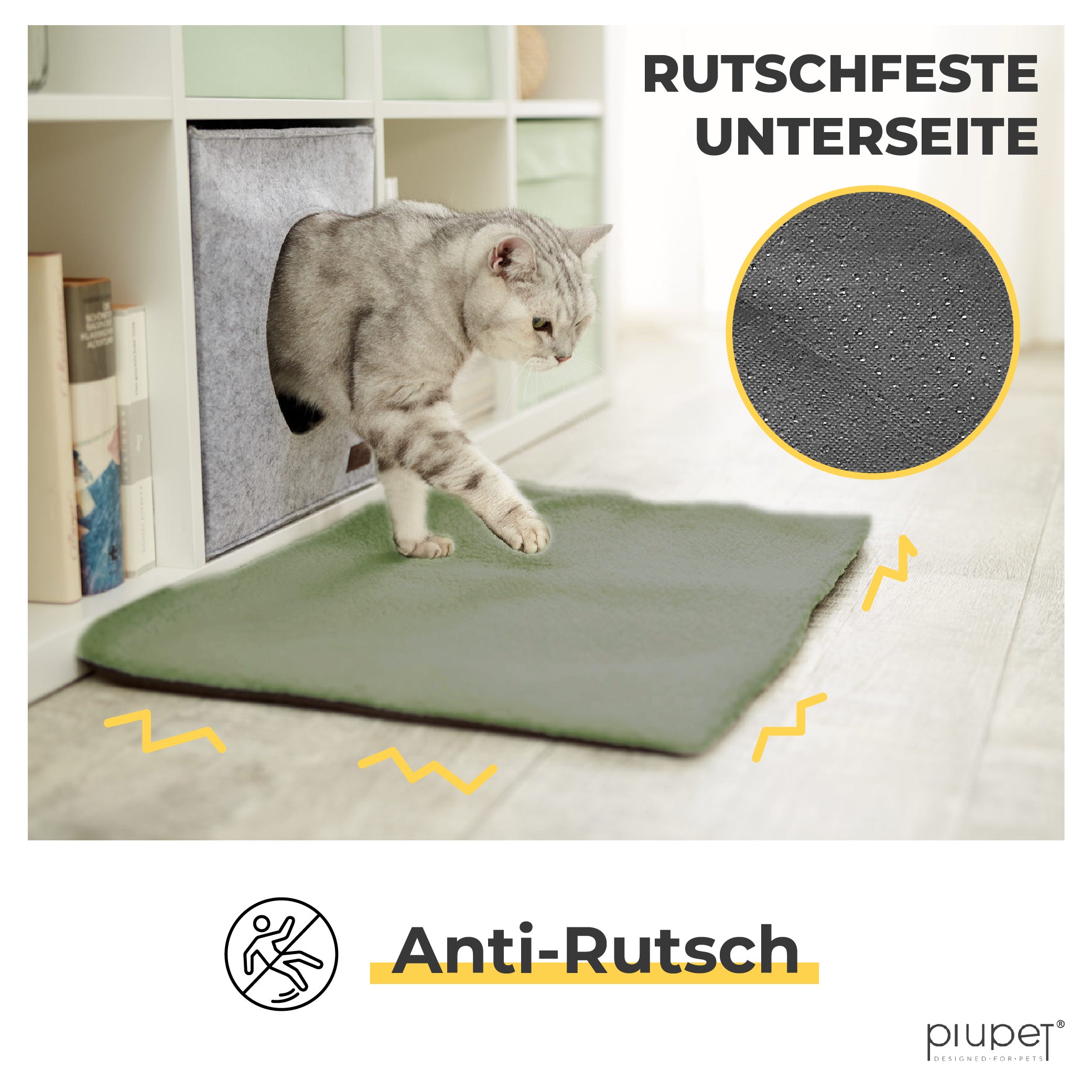 Katze steigt auf eine grüne Matte mit rutschfester Unterseite, Größe 45 × 60 cm.