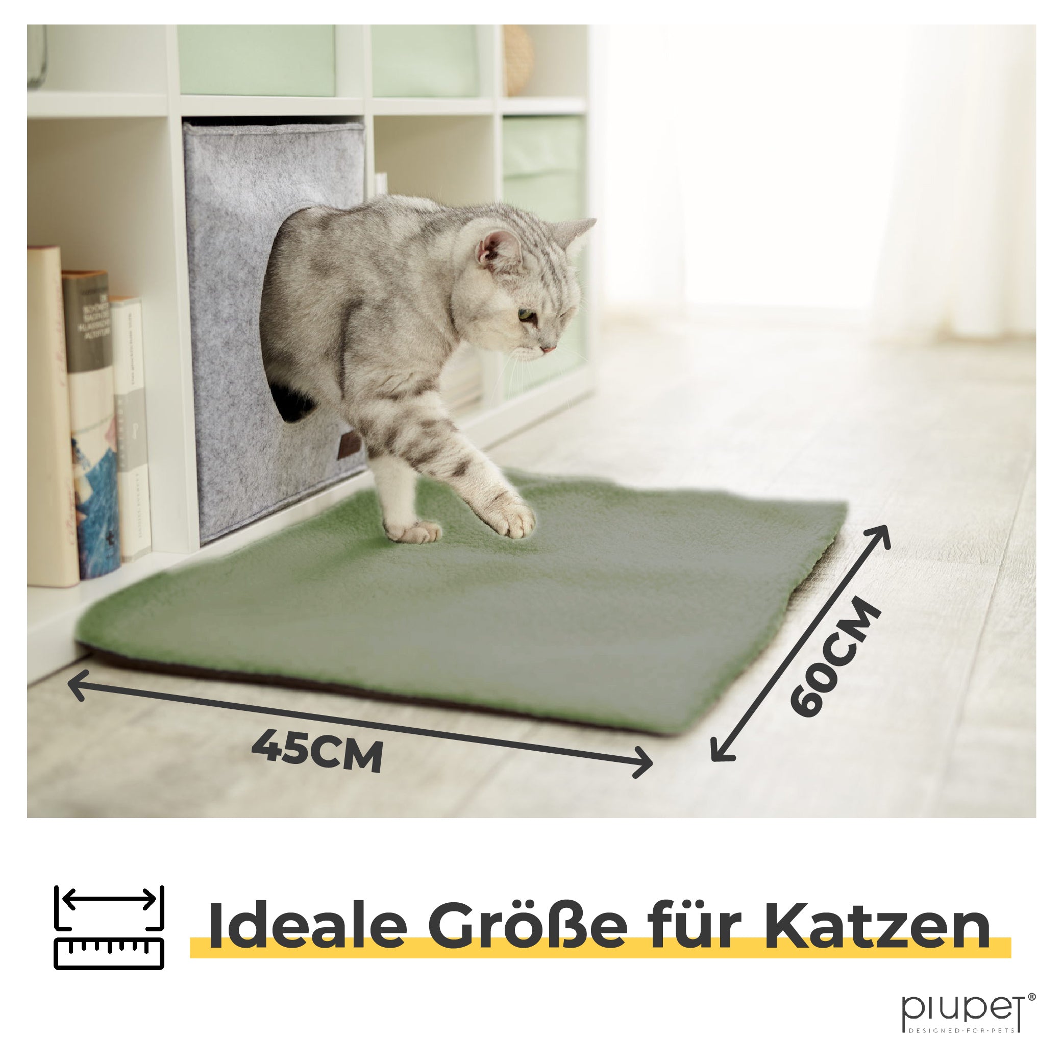 Katze steigt auf eine grüne Matte mit rutschfester Unterseite, Größe 45 × 60 cm.